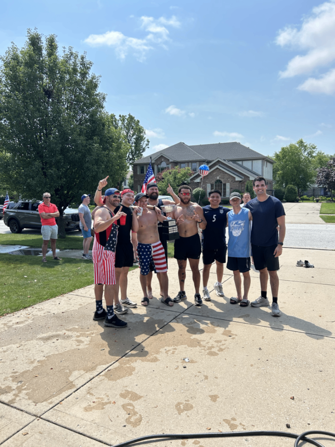 Peace signs and pointing — victors mid-celebration