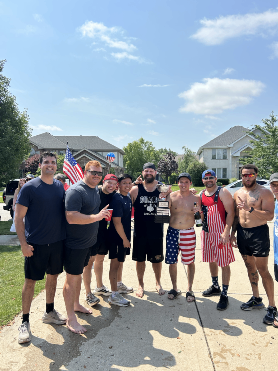 Champagne, trophy, and stars-and-stripes shorts